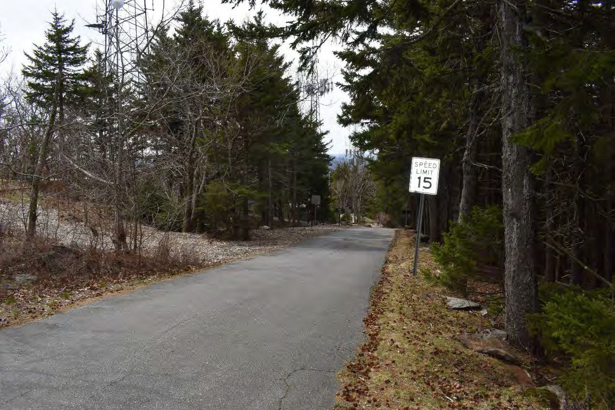 Pack Monadnock Fire Tower, Peterborough New Hampshire View northeast from platform, showing picnic area, parking lot, trail heads, and park structures (2022)