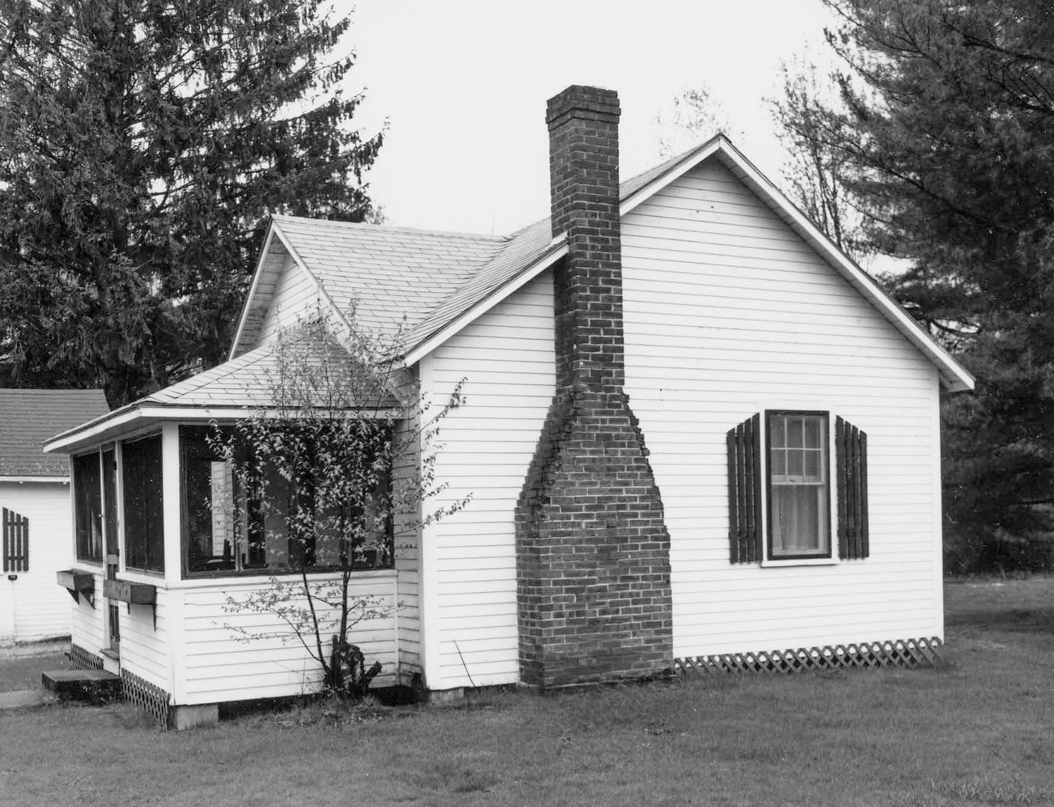 Maple Haven Campground, Woodstock New Hampshire West and north elevations of cabin #3 showing brick chimney (2000)
