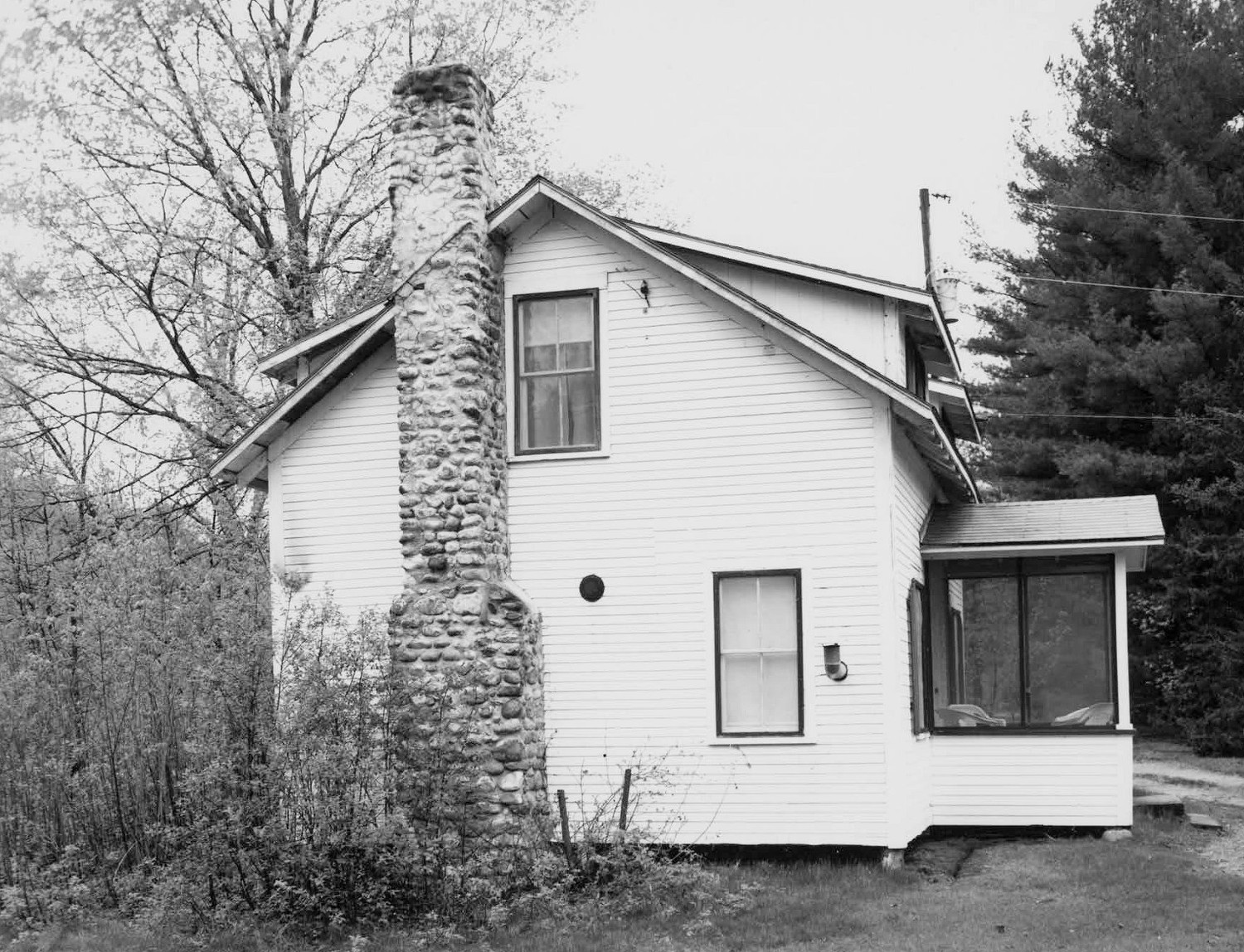 Maple Haven Campground, Woodstock New Hampshire East elevation of cabin #7, showing stone chimney (2000)