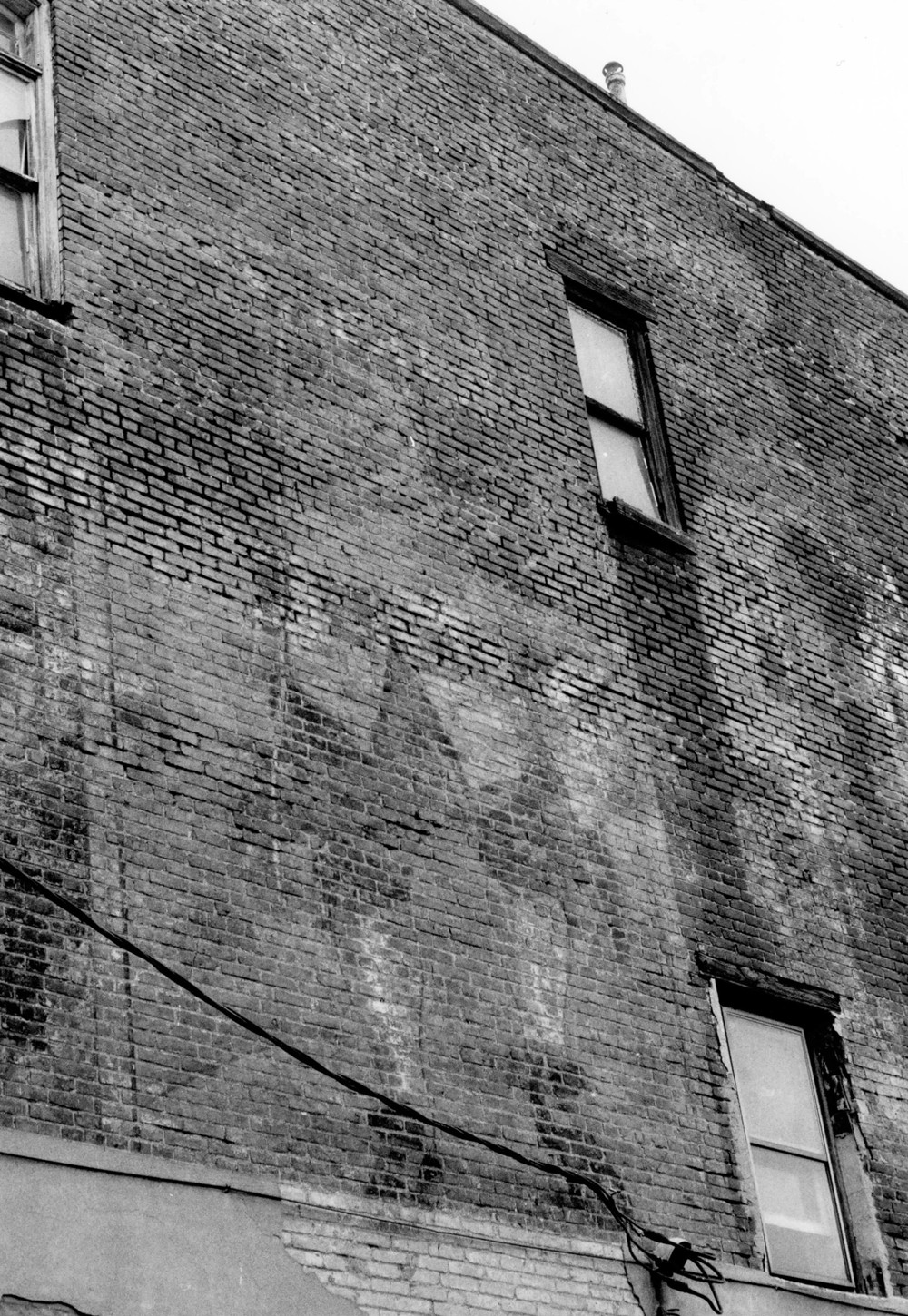 In and Out Social Club, Trenton New Jersey South Facade - Painted Quaker Oats Sign (1987)
