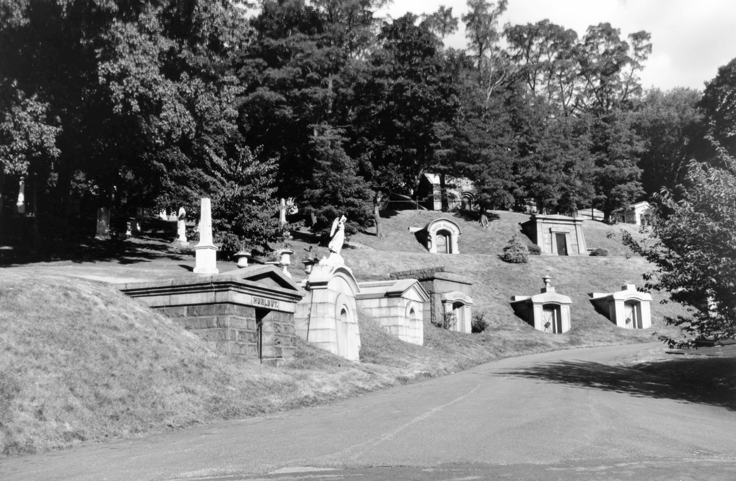 Green-Wood Cemetery-Greenwood, Brooklyn New York Hillside tombs along Sycamore Avenue above the Receiving Tomb showing topography and current landscape maintenance (2005)