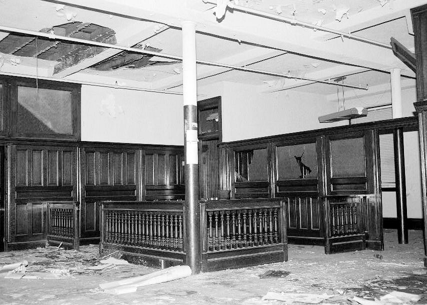 Merrill Silk Mill, Hornell New York 1979 Interior view of offices in Building #4. Photo shows the woodworking in the offices. Wall paneling is six feet high; spindle dividers and paneling are made of maple.