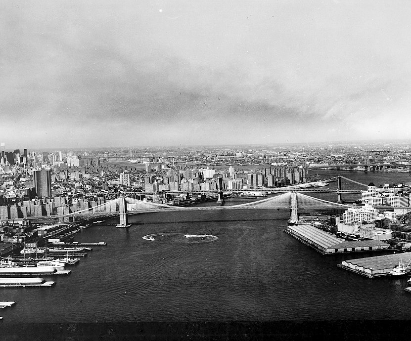 The Brooklyn Bridge, New York New York Long Distance View Looking NE up the East River (1978)