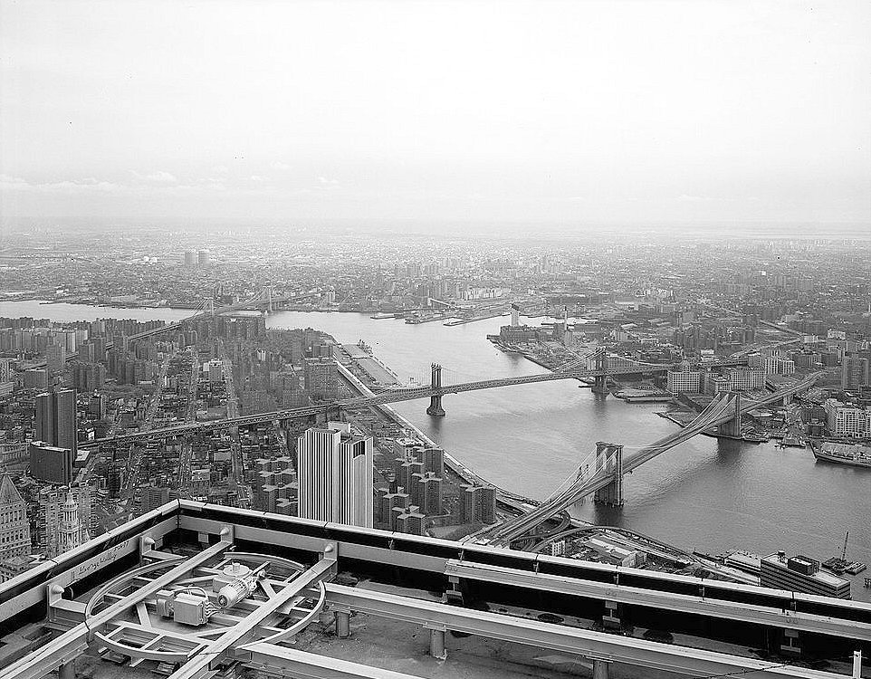 The Brooklyn Bridge, New York New York View Looking E from Top of World Trade Tower with World Trade Tower Parapet in Foreground (1982)