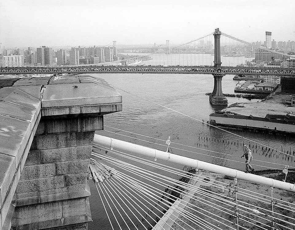 The Brooklyn Bridge, New York New York View from Top of Brooklyn Tower Showing Man Walking up Main Cable, Stay Cables Radiating from Top of Tower and Tower Cornice (1982)