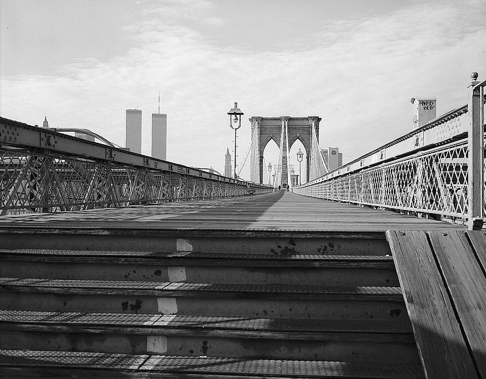 The Brooklyn Bridge, New York New York View towards Manhattan Looking over Edge of Steps Down Length of Promenade with Brooklyn Tower in Background (1982)