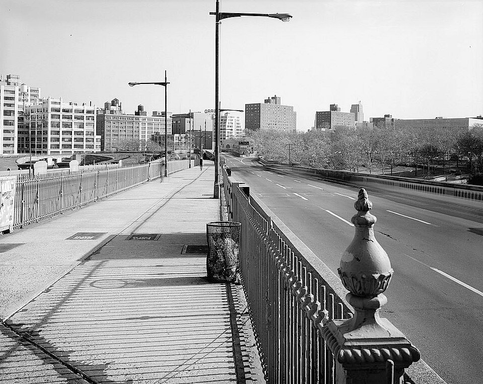 The Brooklyn Bridge, New York New York View Looking SE Down Promenade towards Brooklyn with Brooklyn Tower and Bicyclist in Background (1982)