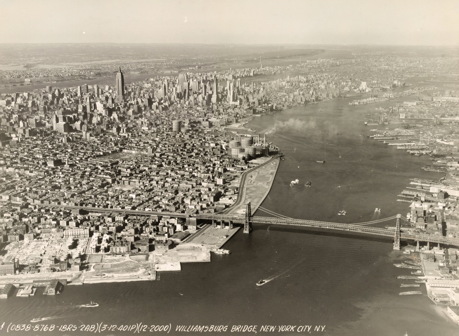Williamsburg Bridge, New York New York Williamsburg bridge through New York Financial District (date unknown)