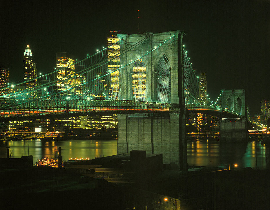 The Brooklyn Bridge, New York New York Night View Looking Northwest Showing Bridge Lighted (1982)