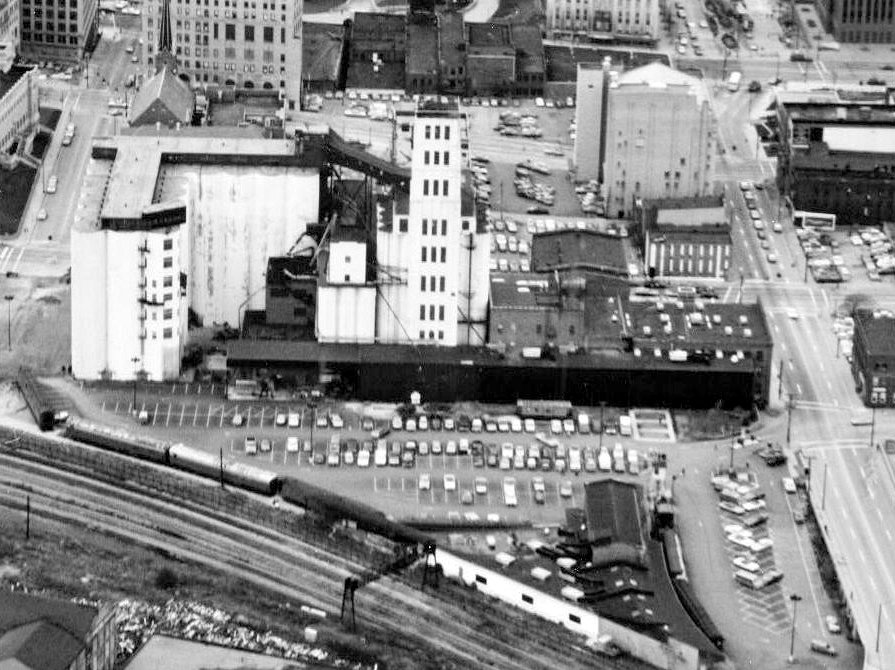 Quaker Oats Cereal Factory, Akron Ohio Aerial photograph of the Quaker Oats Cereal Factory looking east to west. Structures included in this complex situated on the east side of Broadway Street between Bowery Street and Mill Street range in date of original use from 1886 to 1940 (1979)
