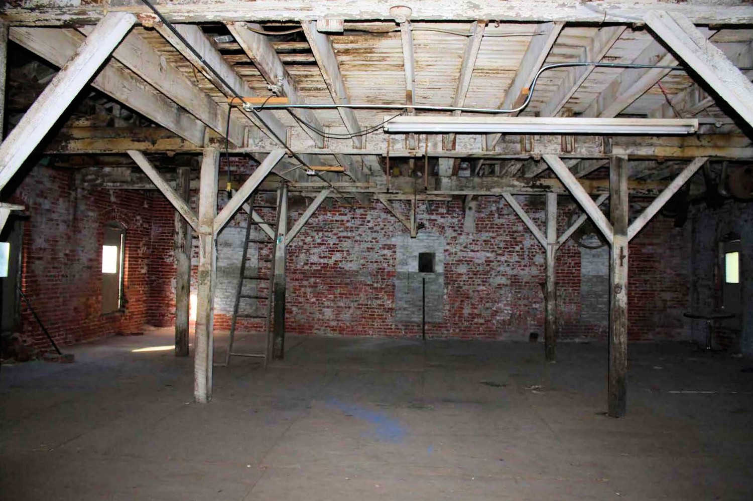 Akron Soap Company - Pioneer Cereal, Akron Ohio Interior view of the west wing, third floor, showing the later mezzanine construction and the supporting posts (2013)