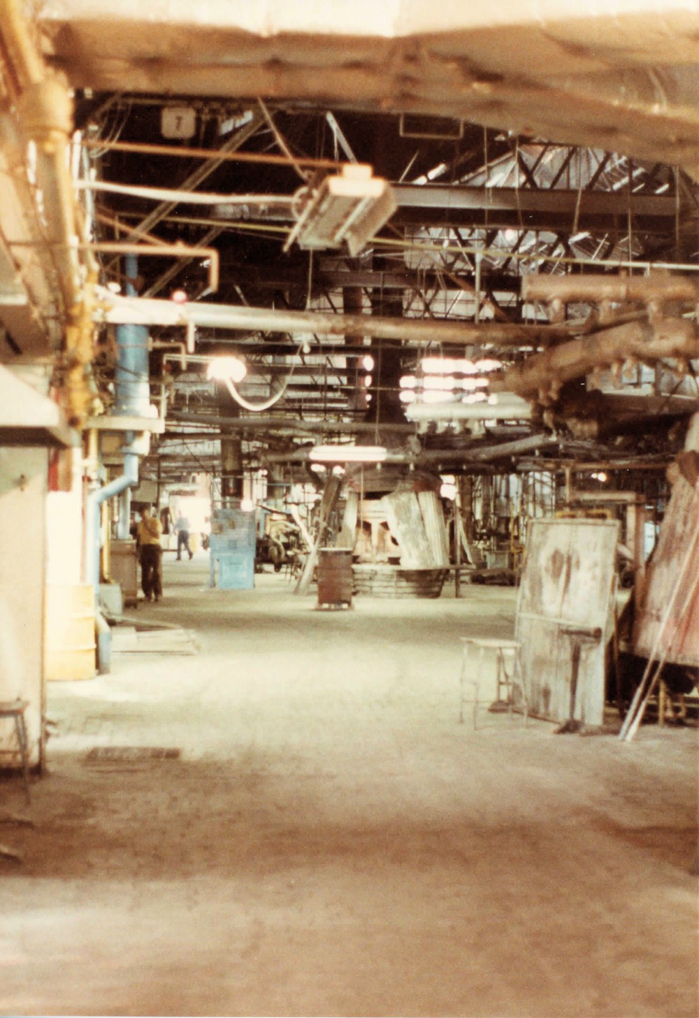 Imperial Glass Company, Bellaire Ohio Hot metal room with lehrs to left and glory holes (1983)