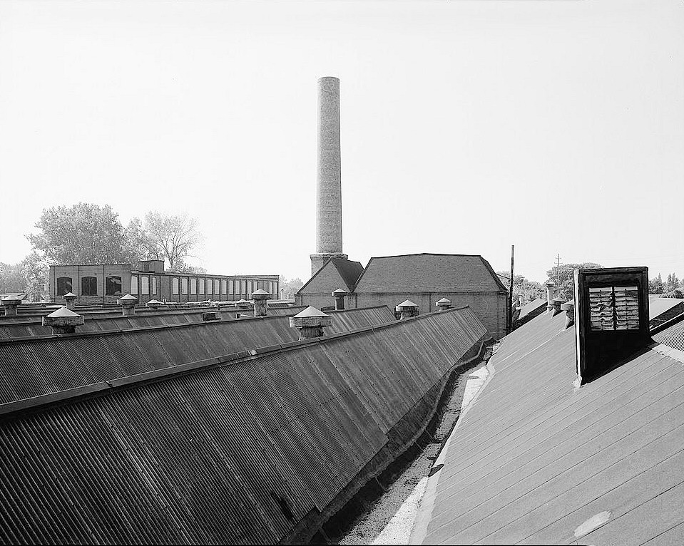 Baker Motor Vehicle Company - Rauch and Lang Carriage Company Cleveland Ohio 1979 Assembly Building roof, Power Plant (center), American Bail-Bearing Company offices (left), looking west