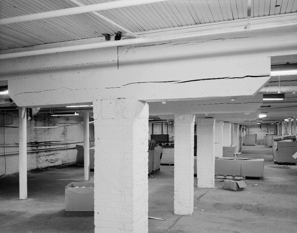 Baker Motor Vehicle Company - Rauch and Lang Carriage Company Cleveland Ohio 1979 Assembly Building substructures (brick piers, stone capitals, timber bolster blocks)