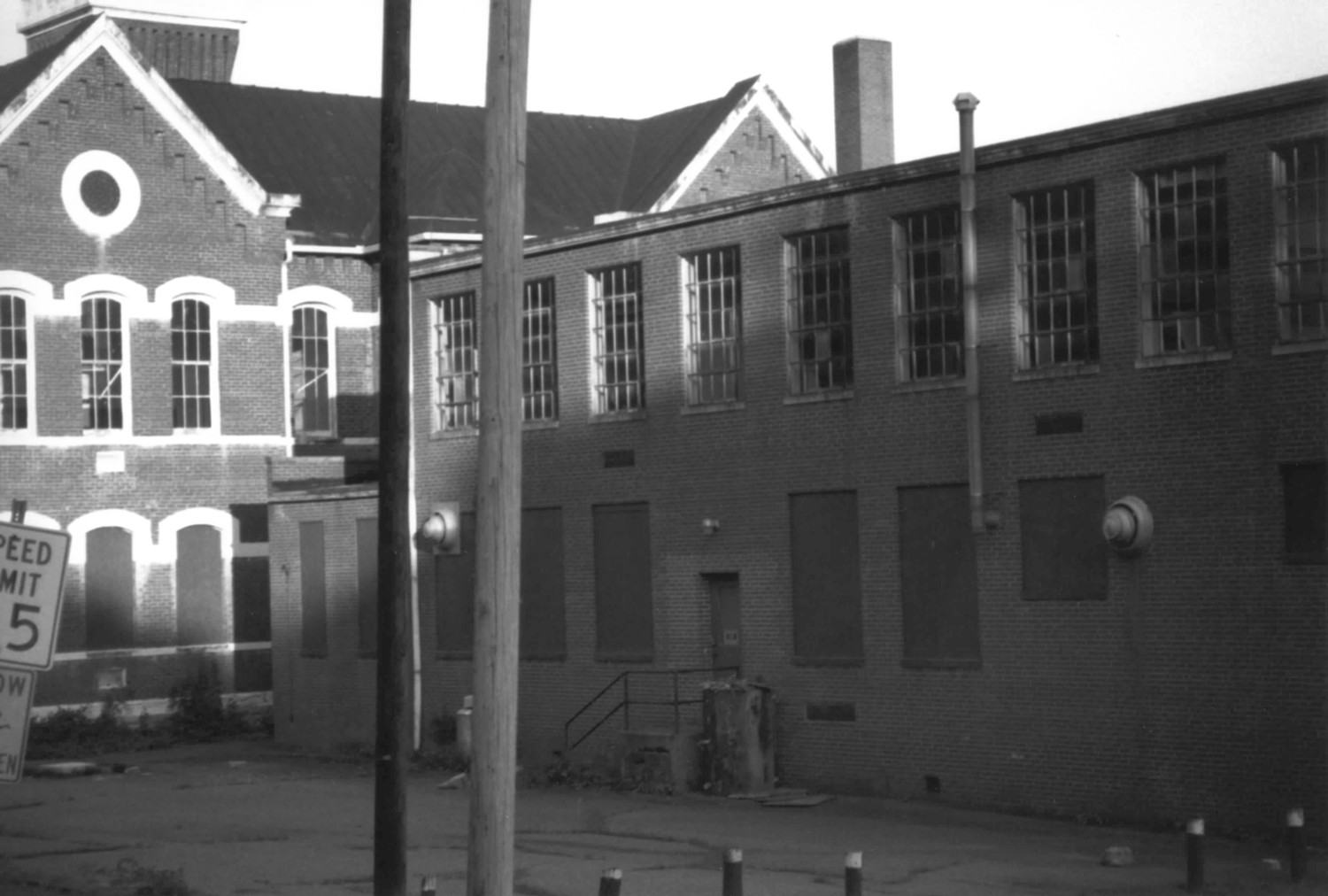 Higginsport School, Higginsport Ohio West elevation of original school and north elevation of classroom addition, looking southeast (1998)