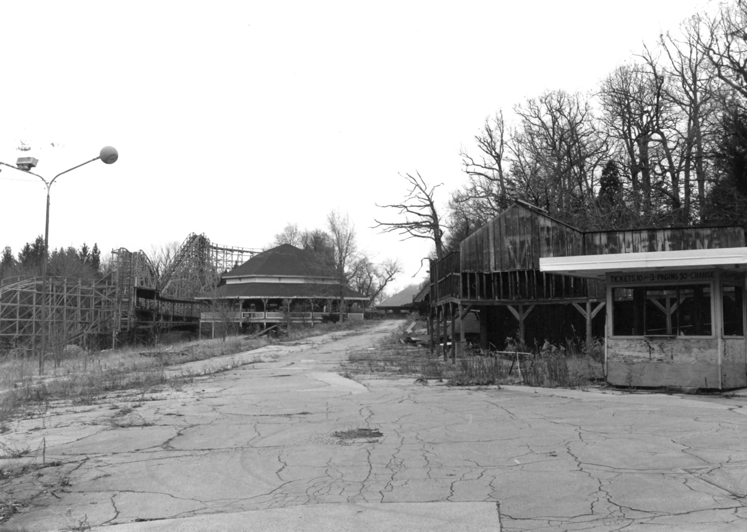 Idora Park, Youngstown Ohio Midway, looking north from the ballroom, showing the ticket booth at right and the merry-go-round and the Wildcat roller coaster at left (1992)