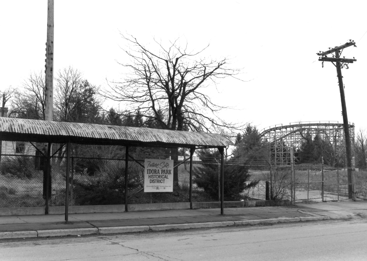 Idora Park, Youngstown Ohio North entrance bus shelter along McFarland Avenue, looking southwest and showing the Wildcat roller coaster in the distance (1992)