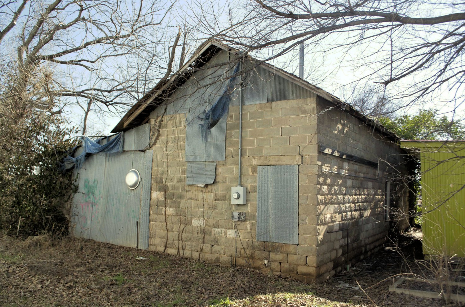 Edmond Ice Company, Edmond Oklahoma Stable north (back) and west side elevations (2016)