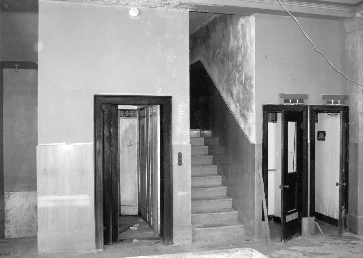 Hotel Franklin, Mangum Oklahoma Elevator, stairs, and telephone booths in lobby (2007)