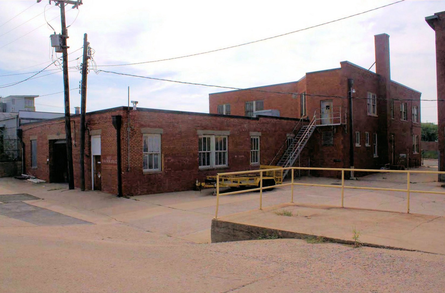 Pioneer Telephone Company Warehouse and Garage, Oklahoma City Oklahoma Loading docks at the rear of 1-7 northeast 6<sup>th</sup> (2017)
