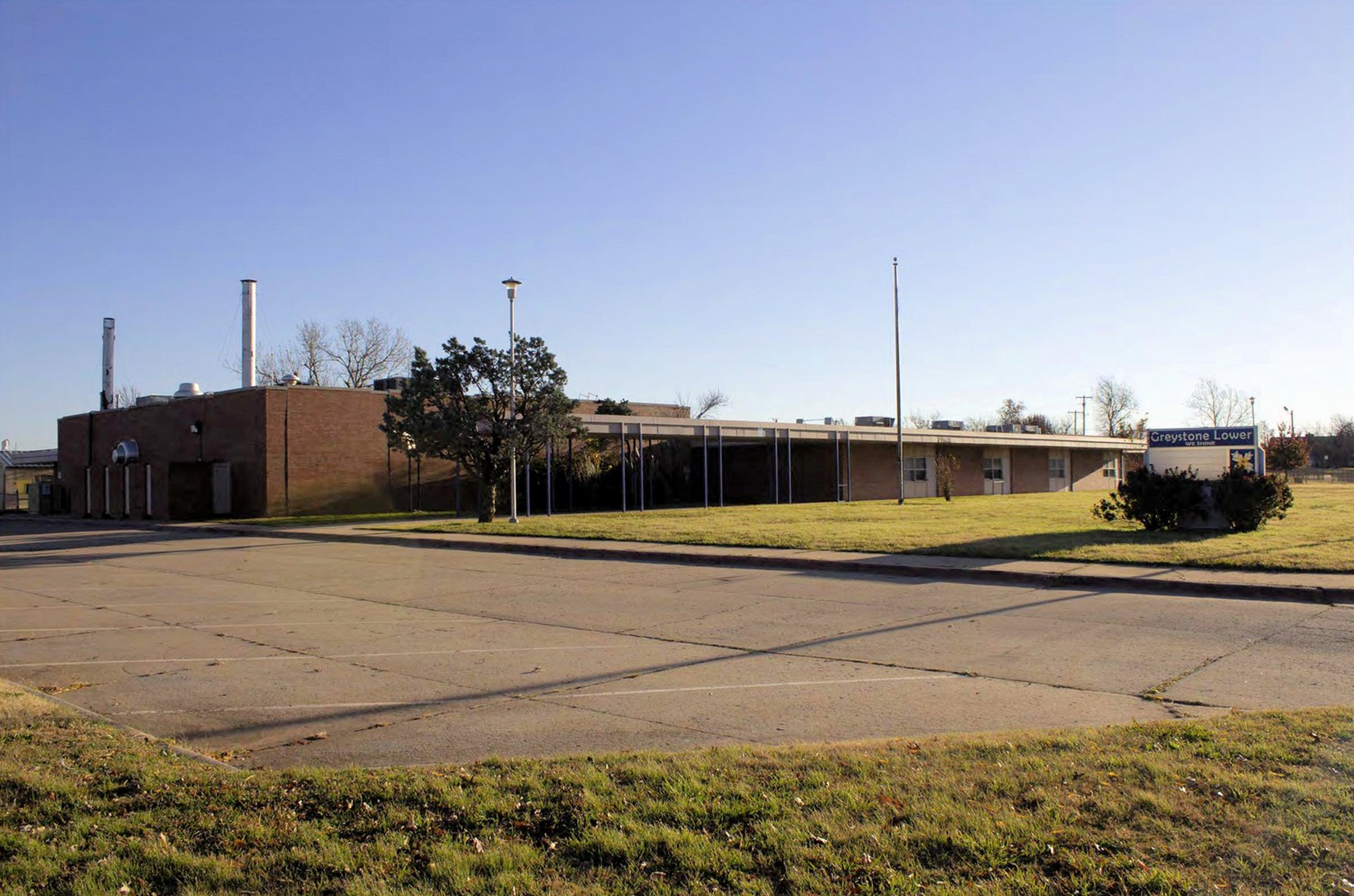 West side elevation (left) and south looking facade (right) (2017)