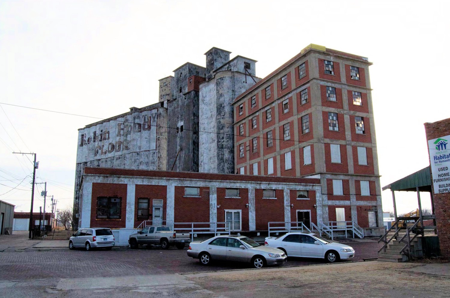 Ponca City Milling Company Elevator, Ponca City Oklahoma North elevation with the east elevation visible beyond (2018)