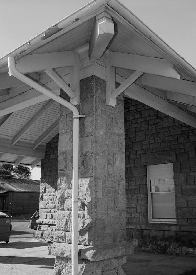 Bend Railroad Depot - Oregon Trunk Railway Passenger Station, Bend Oregon 1999 Southeast corner of porte cochere, showing the roof construction, bracketing and stonework of the column