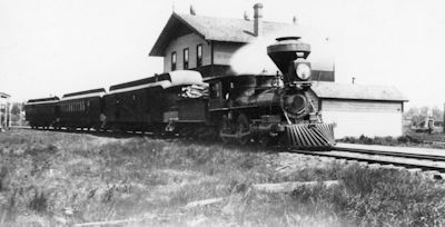 Willamette Valley and Coast Railroad Depot, Corvallis Oregon Historic photograph showing original gable trim and water barrels on ridge (1890s)