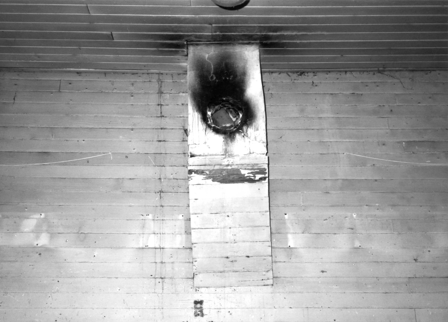 Victor Point School, Silverton Oregon Close-up of hanging chimney. Small rectangle area below and to left of chimney is a mark where the hanger for gas lantern was located (1996)