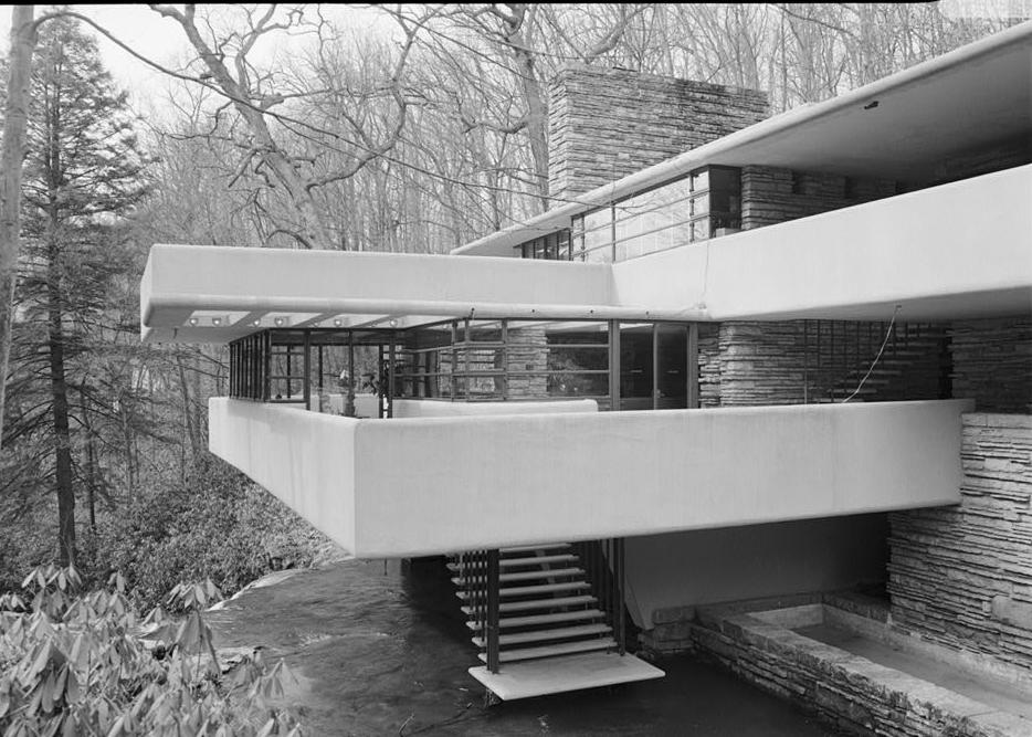 FallingWater - Frank Lloyd Wright House, Mill Run Pennsylvania EAST TERRACE OF FIRST FLOOR OF HOUSE FROM SOUTH END OF BRIDGE.
