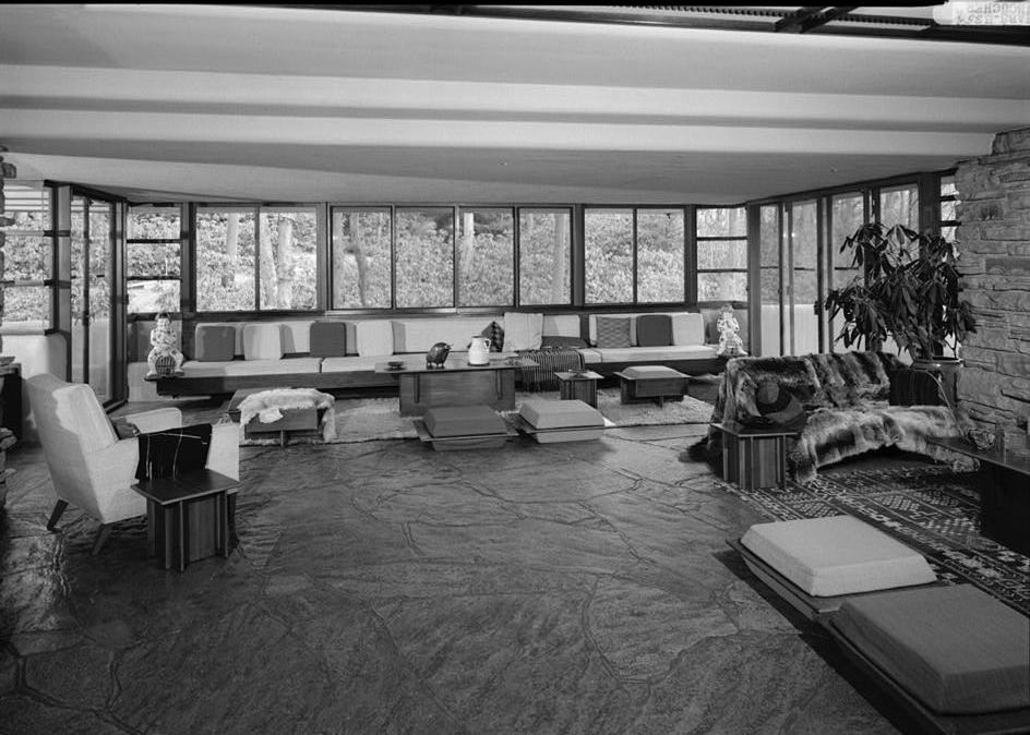 FallingWater - Frank Lloyd Wright House, Mill Run Pennsylvania SOUTH END LIVING ROOM SEEN FROM DINING AREA.