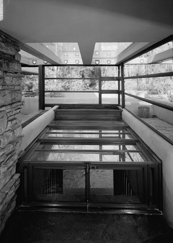 FallingWater - Frank Lloyd Wright House, Mill Run Pennsylvania HATCH OVER STEPS TO STREAM, BENEATH TRELLIS SKYLIGHTS, IN SOUTHEAST CORNER OF LIVING ROOM