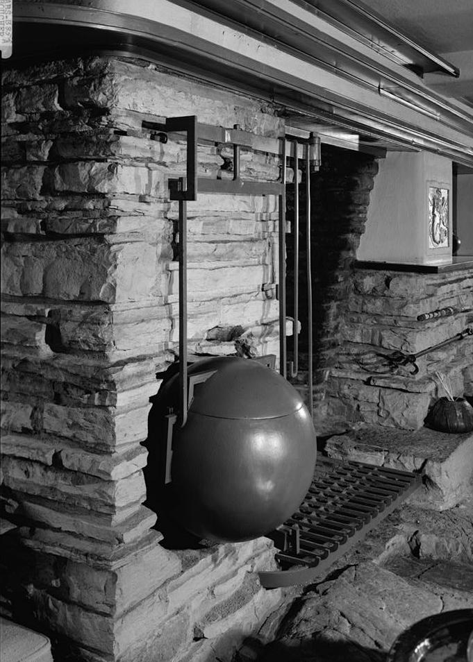 FallingWater - Frank Lloyd Wright House, Mill Run Pennsylvania WINE KETTLE ON WELDED CRANE RESTING IN NICHE, WEST WALL OF LIVING ROOM.