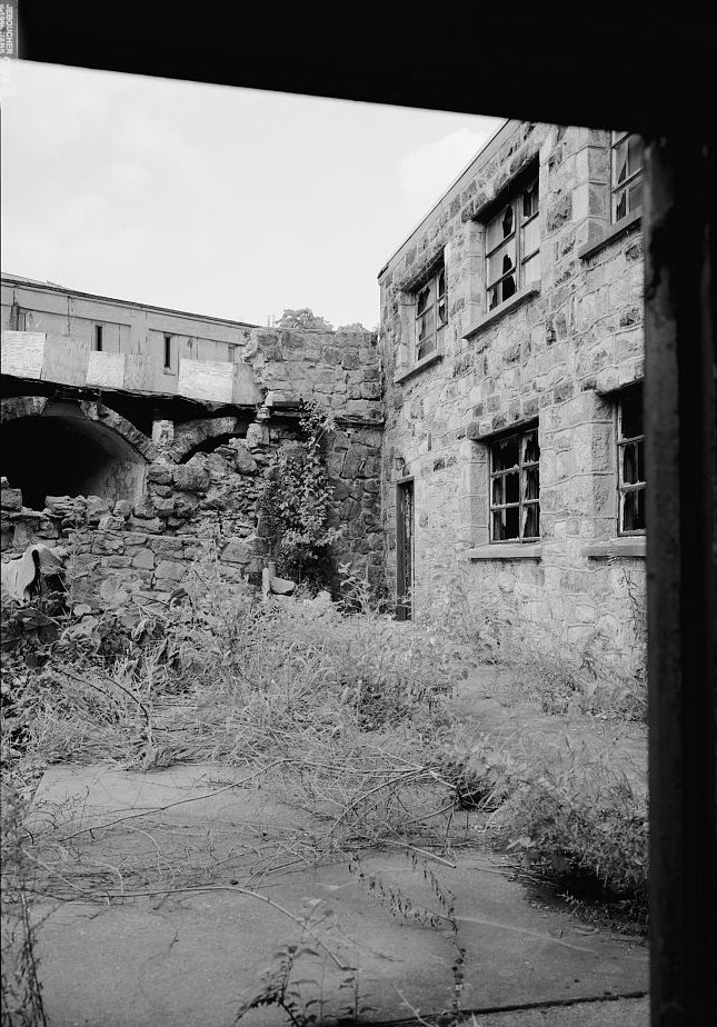 Eastern State Penitentiary, Philadelphia Pennsylvania Cell block eleven (left) and cell block fifteen, looking from cell block two into the "Death Row" exercise yard (1998)