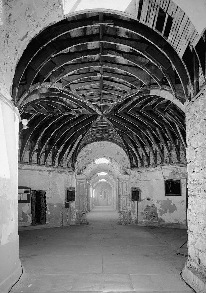 Eastern State Penitentiary, Philadelphia Pennsylvania Interior view, south corridor, junction of cell blocks eight and nine, facing north (1998)