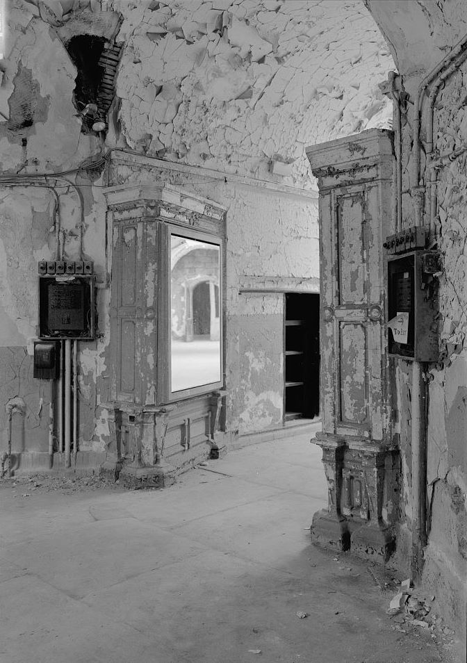 Eastern State Penitentiary, Philadelphia Pennsylvania Interior view, south corridor at cell blocks eight and nine (note mirror container cabinets) (1998)