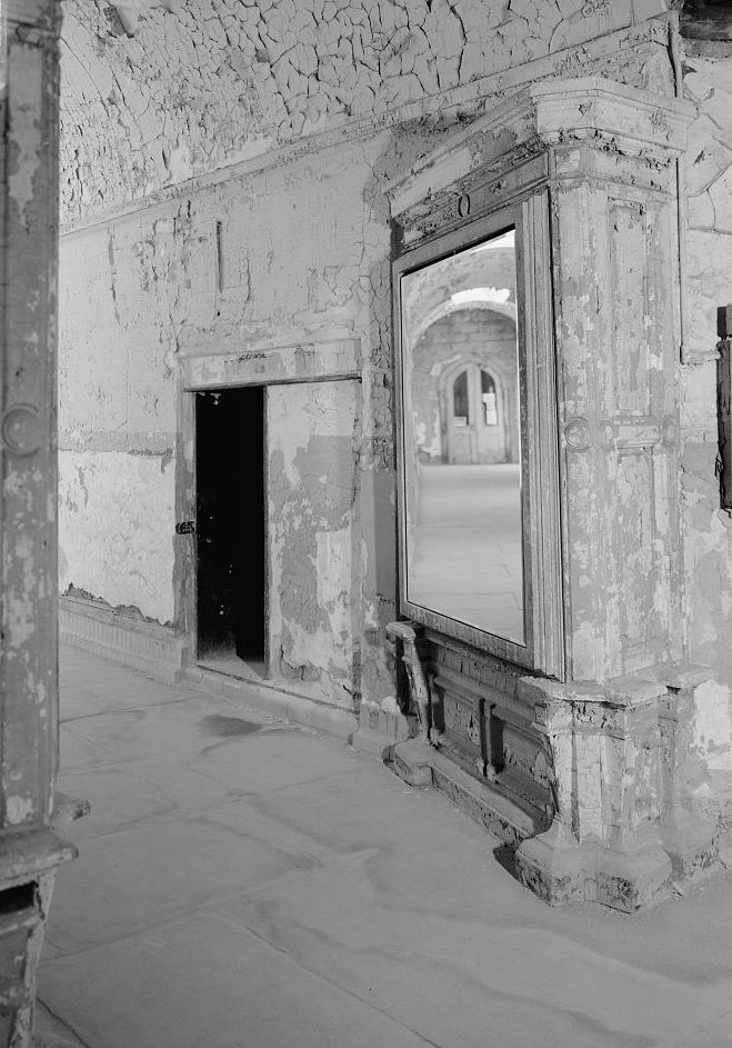 Eastern State Penitentiary, Philadelphia Pennsylvania Interior view, south corridor at cell blocks eight and nine (note closed rotunda doors in mirror) (1998)