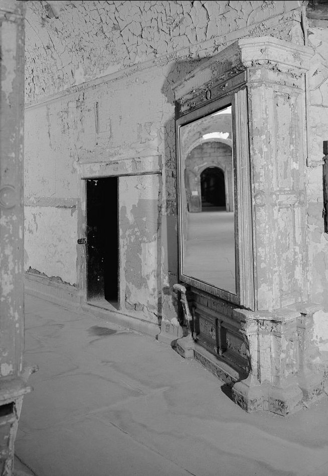 Eastern State Penitentiary, Philadelphia Pennsylvania Interior view, south corridor at cell blocks eight and nine (note open rotunda doors in mirror) (1998)