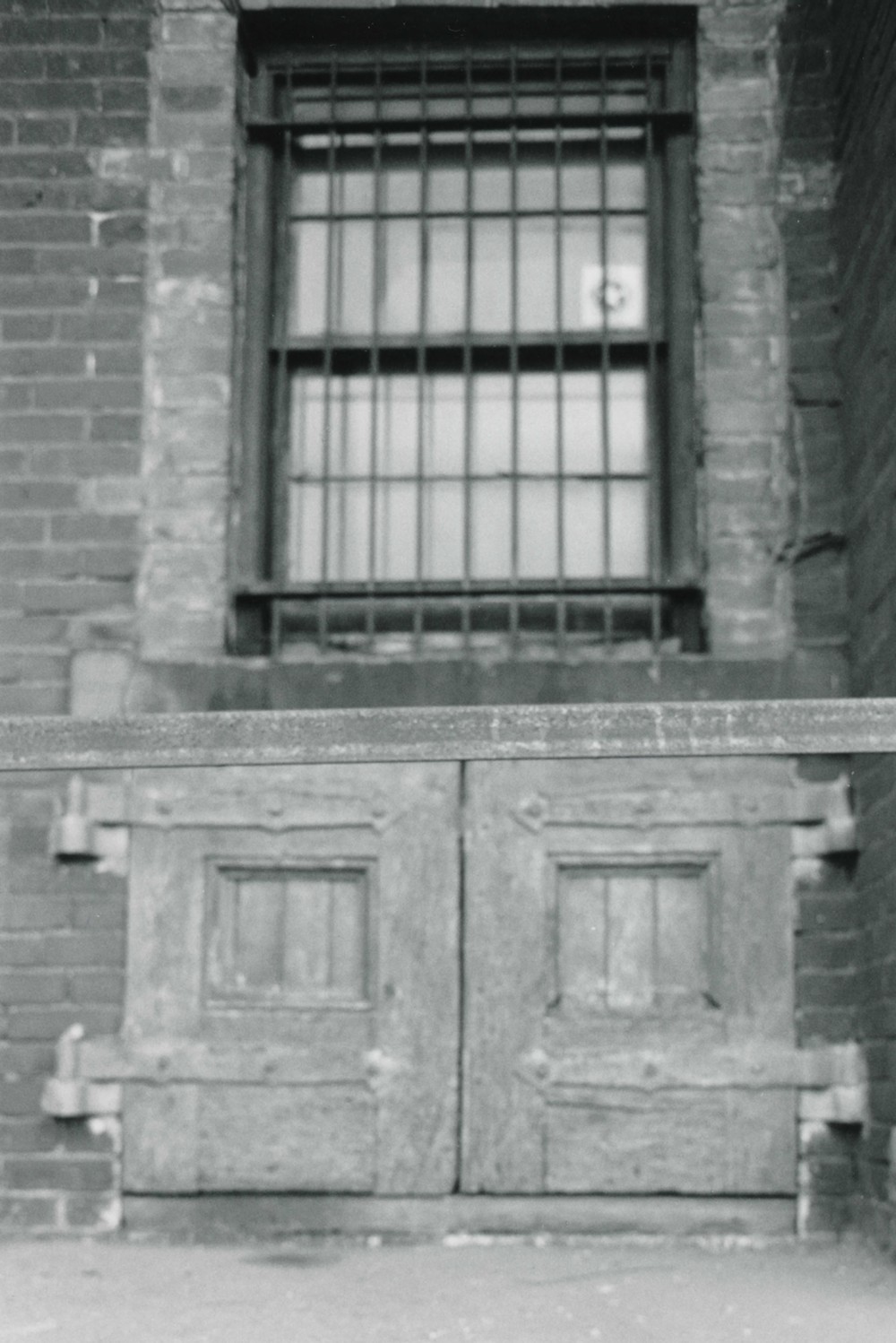 Eberhardt and Ober Brewery, Pittsburgh Pennsylvania Detail of window with keg doors in Brewery facade (1986)