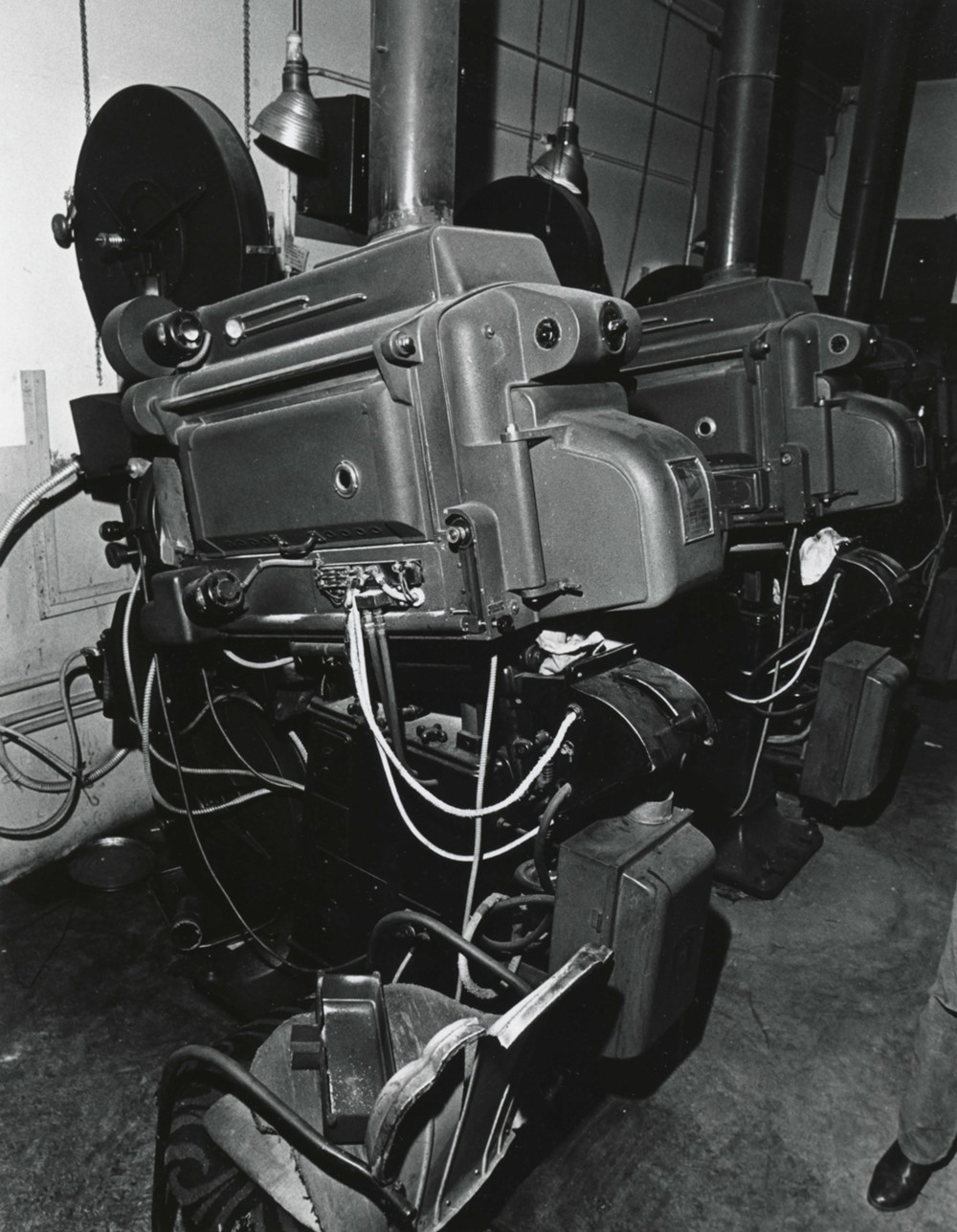 Comerford Theater - Paramount Theatre, Wilkes-Barre Pennsylvania Projection equipment (circa 1936) in the projection booth. Carbon-arc generator driven Ashcraft lamps; Super Simplex heads driven by Western Electric Sound Heads. Heads were rebuilt in 1974. (1979)