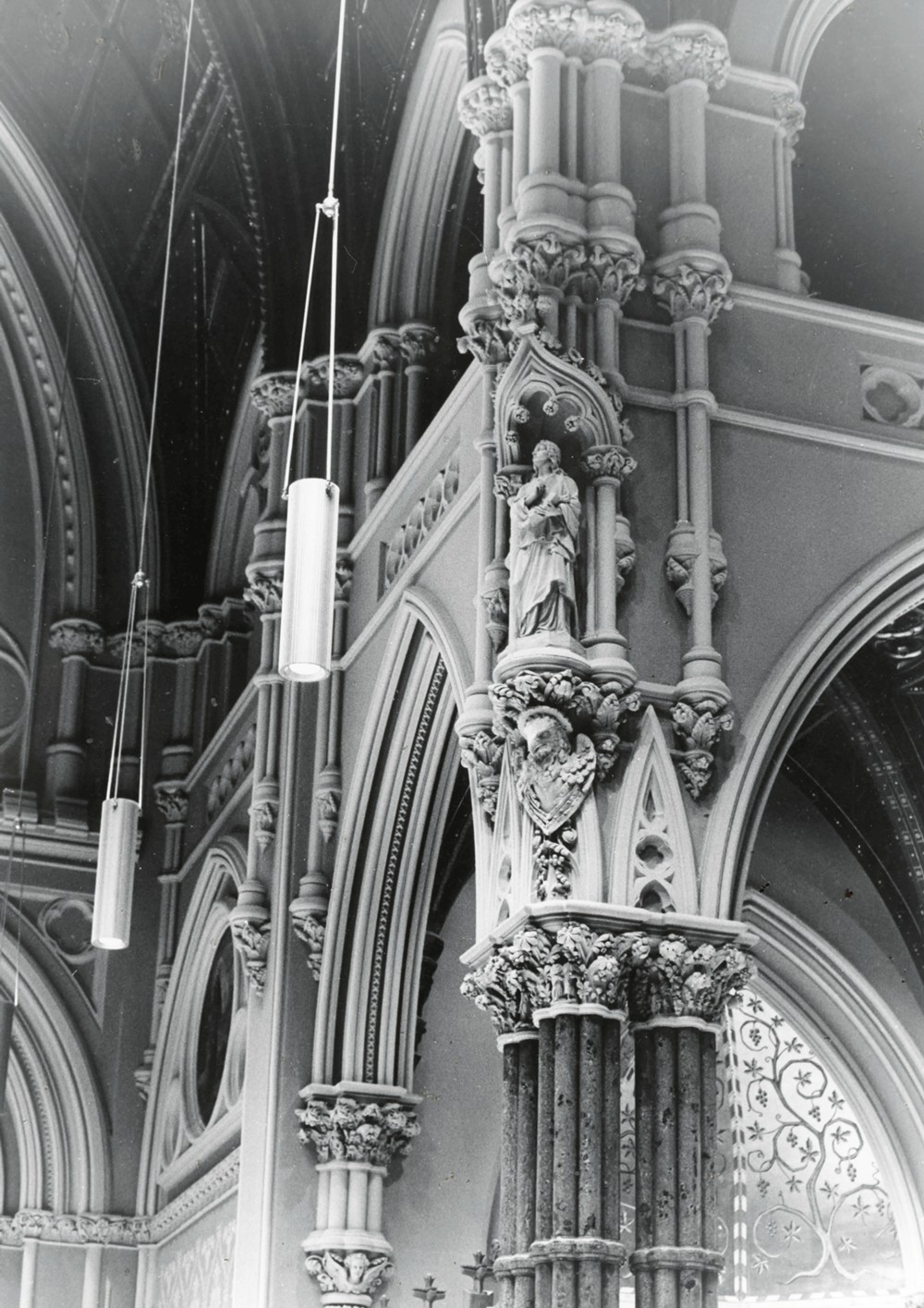 Cathedral of Saints Peter and Paul, Providence Rhode Island Detail of columns, arches, gallery at crossing area, showing a portion of the sanctuary at left and a portion of the west transept at right (1974)