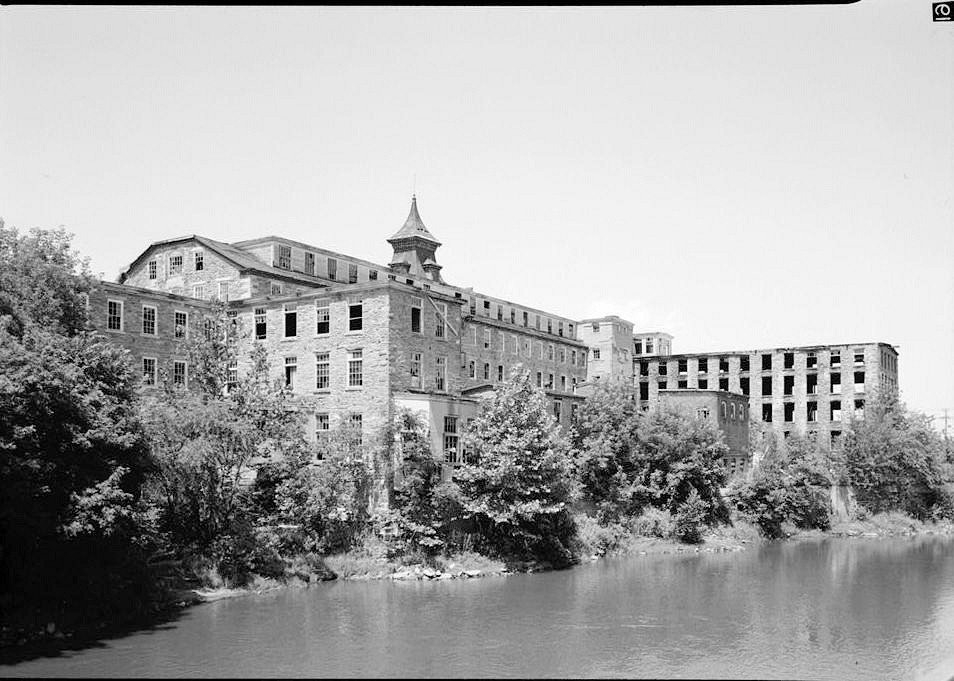 Clinton Mill, Woonsocket Rhode Island 1969 PICKER HOUSE, ENGINE HOUSE, SHOPS, BOILER HOUSE, 1893 ADDITION AND MAIN MILL (BACKGROUND), VIEW LOOKING NORTH.