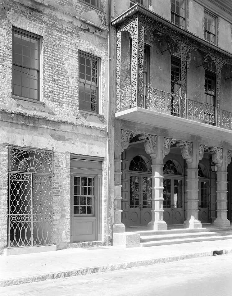 Columned porch, entrance openings and iron balcony - Dock Street Theatre, Charleston South Carolina