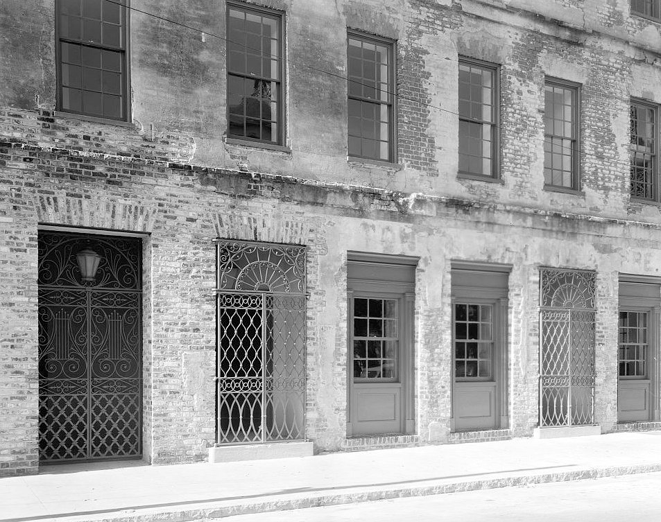 Courtyard entrance gate and brick facade - Dock Street Theatre, Charleston South Carolina
