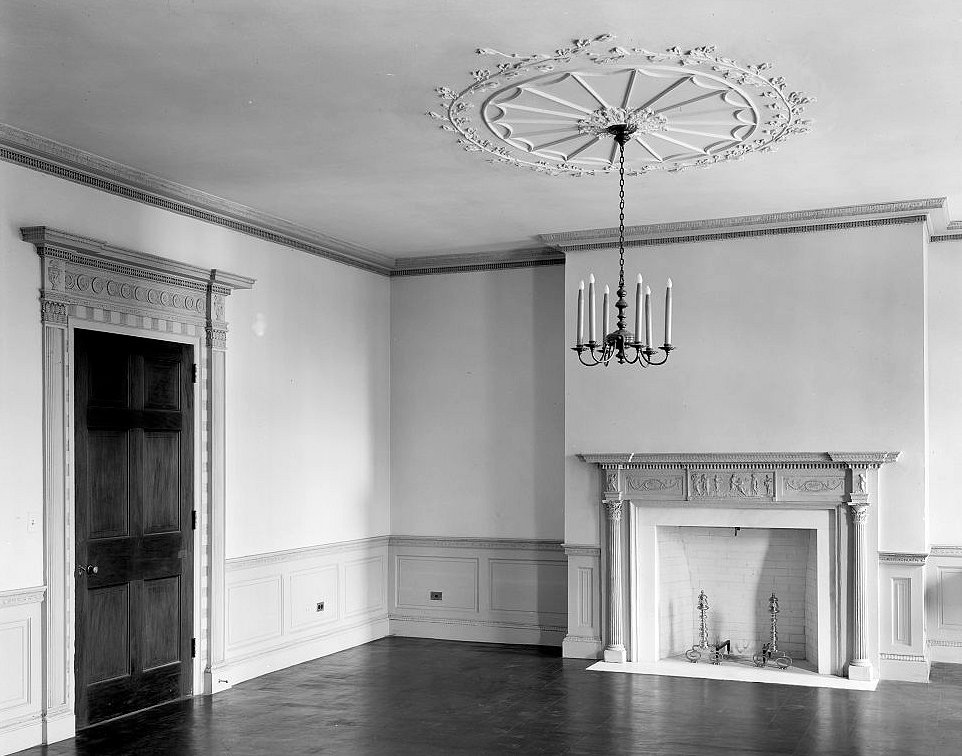 Reception room with fireplace and chandelier - Dock Street Theatre, Charleston South Carolina