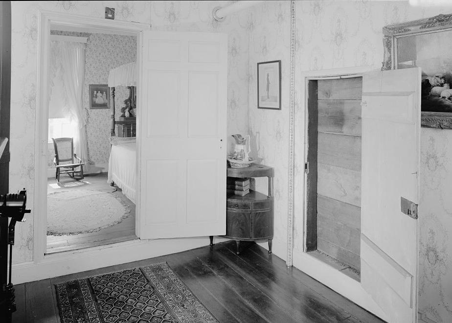 Fort Hill - McElhenny-Calhoun-Clemson House, Clemson South Carolina Master bedroom looking northwest to show board & batten door opened to reveal original planks; note; nursery beyond door to west