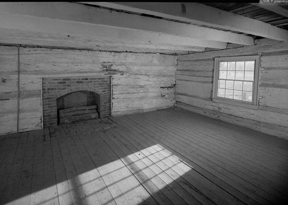 The Hermitage - Andrew Jackson House, Nashville Tennessee 1999 Interior view of south room, looking to southwest corner, with scale to left (east) of fireplace; view includes the window in the west wall, white washed ceiling joists and log walls, and the brick fireplace & hearth