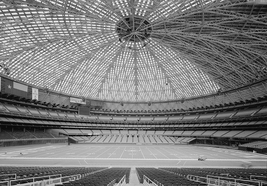 Houston Astrodome, Houston Texas 2004 VIEW SOUTH TOWARD MOVEABLE FIELD LEVEL SEATS. NOTE RETRACTABLE PENTAGONAL LIGHT RING GONDOLA SUSPENDED FROM ROOF CUPOLA. SKY LIGHTS PAINTED OVER TO REDUCE GLARE FOR BASEBALL OUTFIELDERS.