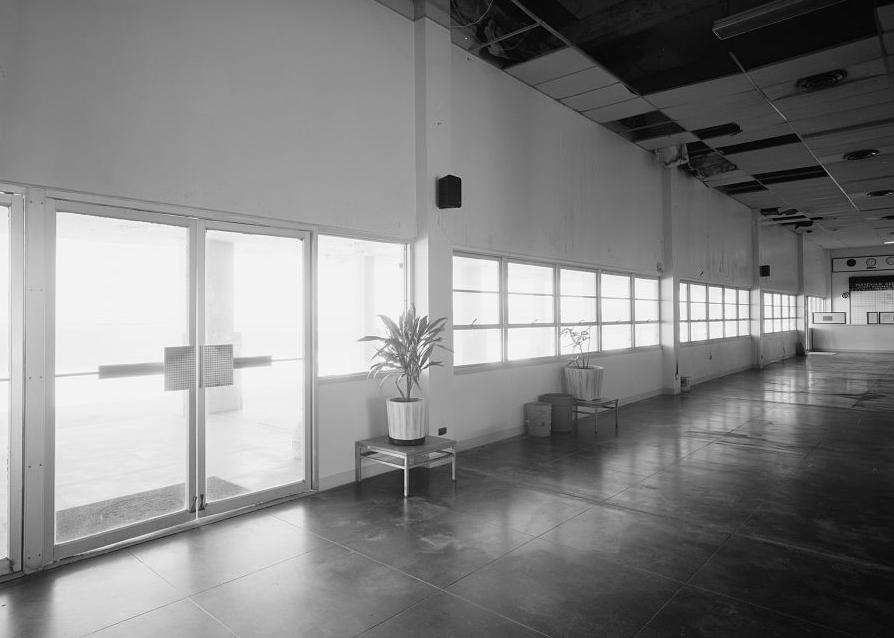 Wake Island Airfield, Terminal Building, Wake Island A VIEW OF THE WEST WINDOW WALL AND PASSENGER ENTRANCE LOOKING NORTHWEST (2008)