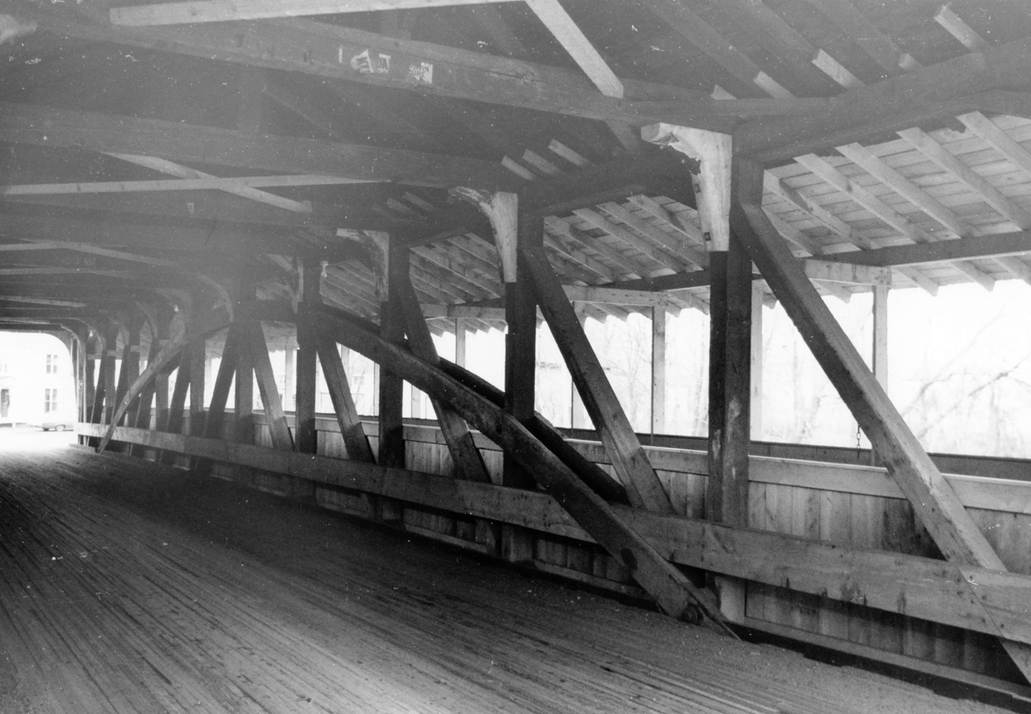 Great Eddy Covered Bridge, Waitsfield Vermont Interior toward north, showing east truss and walkway (1973)